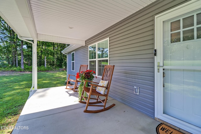 2296 Memory Garden Rd, Jamestown, TN 38556 - porch featuring a yard