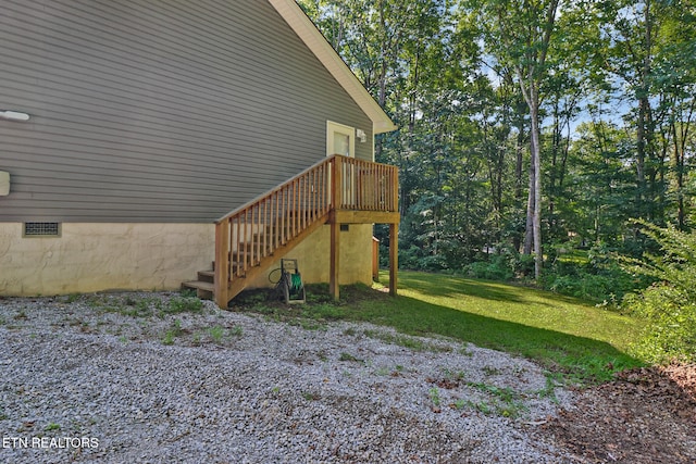 2296 Memory Garden Rd, Jamestown, TN 38556 - view of home's exterior with crawl space, stairway, a deck, and a yard