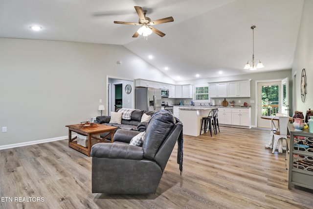 2296 Memory Garden Rd, Jamestown, TN 38556 - living area featuring recessed lighting, light wood-style floors, a chandelier, ceiling fan, and high vaulted ceiling