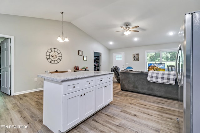2296 Memory Garden Rd, Jamestown, TN 38556 - kitchen with freestanding refrigerator, lofted ceiling, light wood-type flooring, white cabinetry, and a ceiling fan