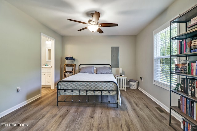 2296 Memory Garden Rd, Jamestown, TN 38556 - bedroom featuring wood finished floors, ensuite bathroom, and a ceiling fan