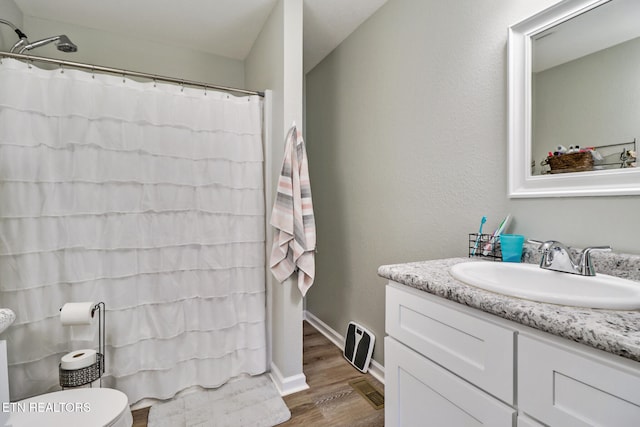 2296 Memory Garden Rd, Jamestown, TN 38556 - bathroom featuring vanity, wood finished floors, and curtained shower