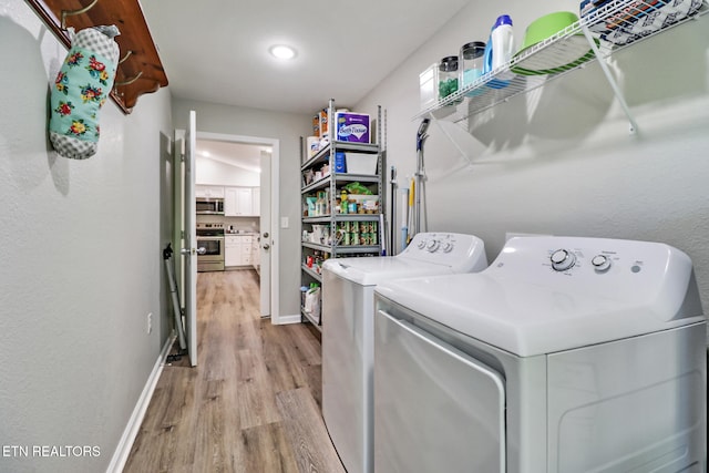 2296 Memory Garden Rd, Jamestown, TN 38556 - laundry room featuring light wood-type flooring and washing machine and clothes dryer