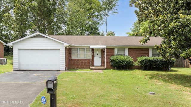 776 Hamilton St, Alcoa, TN 37701 - single story home with a garage, driveway, brick siding, and a front lawn