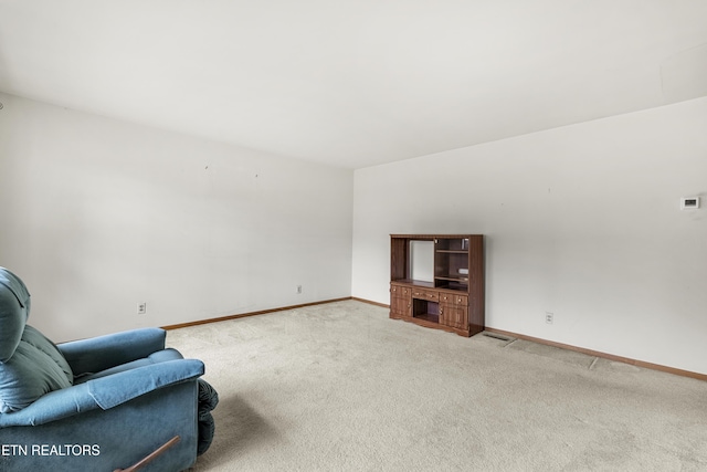 776 Hamilton St, Alcoa, TN 37701 - living room featuring carpet floors and baseboards