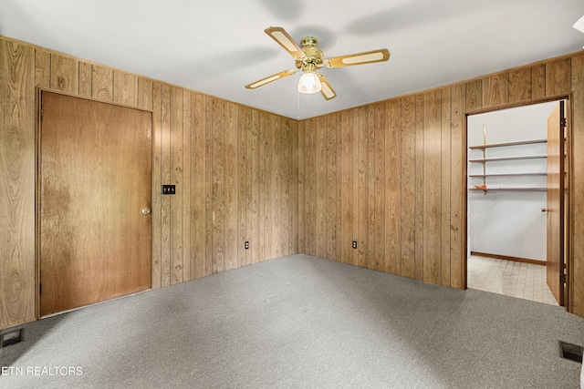 776 Hamilton St, Alcoa, TN 37701 - empty room with wooden walls and ceiling fan