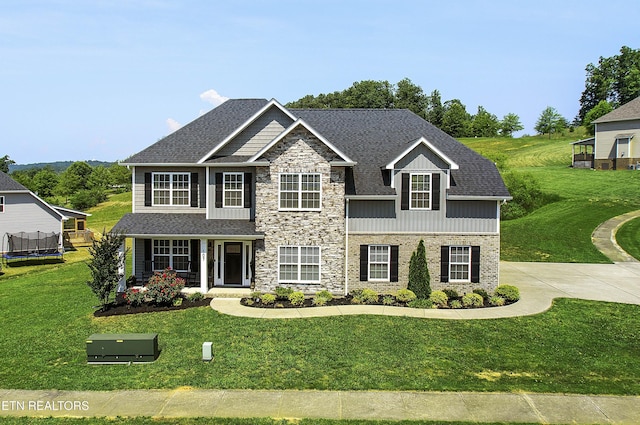 107 Cedarberry St, Oak Ridge, TN 37830 - view of front facade with a front lawn, roof with shingles, and stone siding