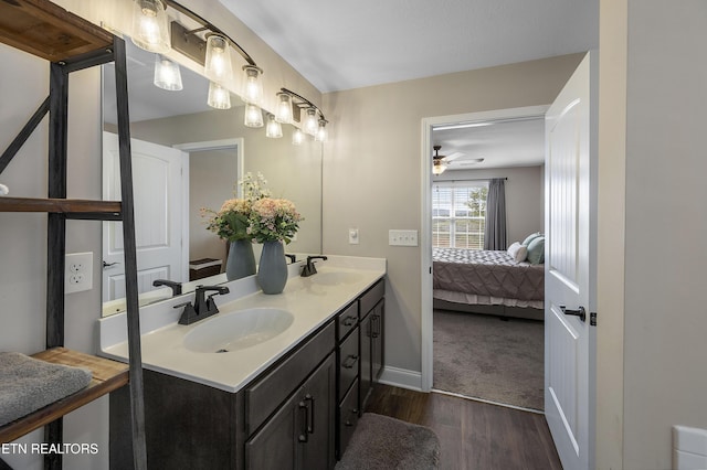 107 Cedarberry St, Oak Ridge, TN 37830 - full bath with wood finished floors, double vanity, connected bathroom, and a ceiling fan