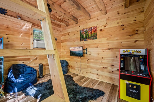 3721 Clabo Mountain Ln, Sevierville, TN 37862 - game room featuring a wood ceiling with exposed beams, wood finished floors, wood walls, and cooling unit