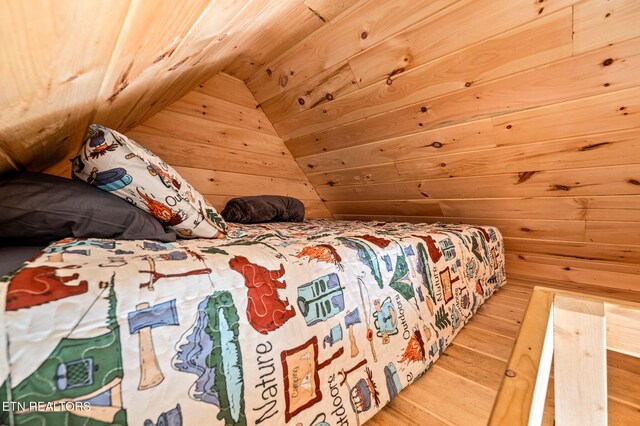 3721 Clabo Mountain Ln, Sevierville, TN 37862 - bedroom featuring wooden walls and wood finished floors