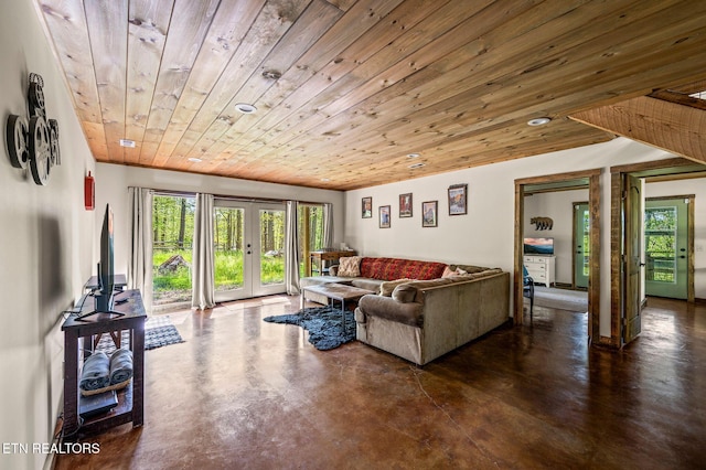 3721 Clabo Mountain Ln, Sevierville, TN 37862 - living room featuring french doors, wooden ceiling, and finished concrete floors