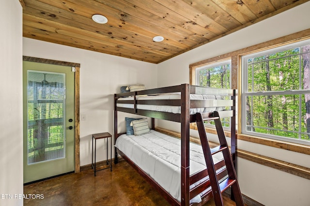 3721 Clabo Mountain Ln, Sevierville, TN 37862 - bedroom with concrete floors and wooden ceiling