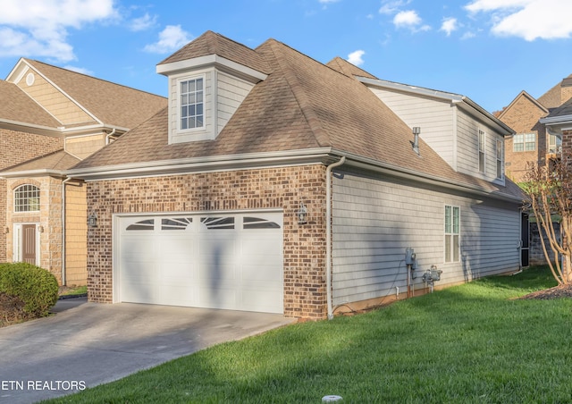 1036 Gothic Manor Way, Knoxville, TN 37923 - view of side of home featuring brick siding, a garage, roof with shingles, driveway, and a yard