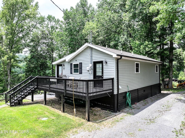 149 Giles Rd, Cosby, TN 37722 - view of front of house featuring a wooden deck, stairs, crawl space, and a front lawn