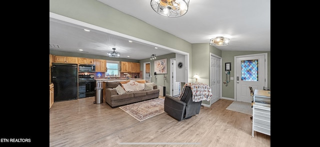 149 Giles Rd, Cosby, TN 37722 - living area featuring light wood-type flooring, a chandelier, and recessed lighting