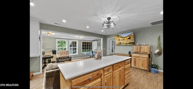 149 Giles Rd, Cosby, TN 37722 - kitchen featuring light wood-type flooring, a chandelier, recessed lighting, a center island, and light countertops