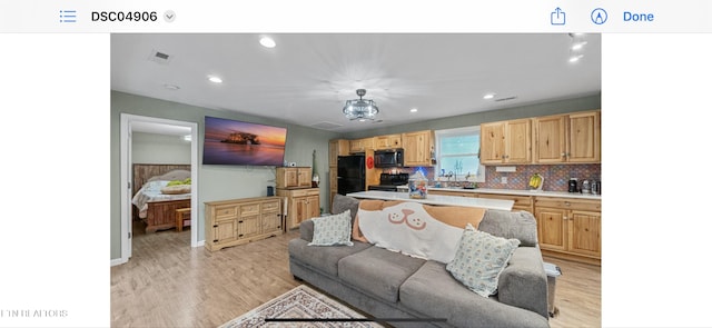 149 Giles Rd, Cosby, TN 37722 - living room with light wood-style floors, recessed lighting, and a chandelier