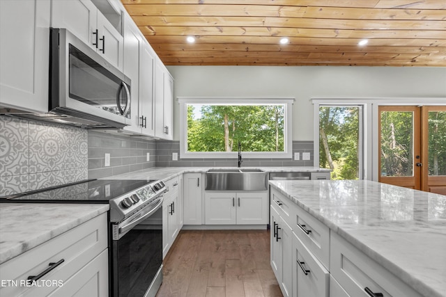 11325 New Highway 68, Tellico Plains, TN 37385 - kitchen featuring stainless steel appliances, wood ceiling, white cabinets, recessed lighting, and light wood-type flooring