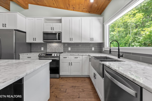 11325 New Highway 68, Tellico Plains, TN 37385 - kitchen with stainless steel appliances, wooden ceiling, vaulted ceiling, decorative backsplash, and white cabinets