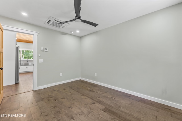 11325 New Highway 68, Tellico Plains, TN 37385 - spare room with a ceiling fan, dark wood-style floors, and recessed lighting