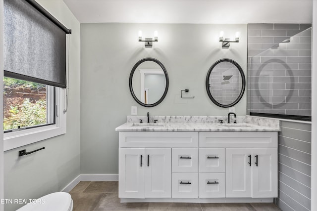 11325 New Highway 68, Tellico Plains, TN 37385 - bathroom featuring double vanity and baseboards