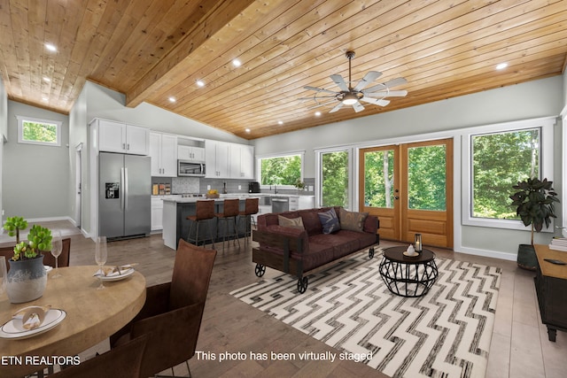 11325 New Highway 68, Tellico Plains, TN 37385 - living area with lofted ceiling, a ceiling fan, wood ceiling, recessed lighting, and light wood-style floors