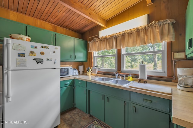 432 W Loop Rd, Gatlinburg, TN 37738 - kitchen with white appliances, a wood ceiling with exposed beams, light countertops, wooden walls, and green cabinetry
