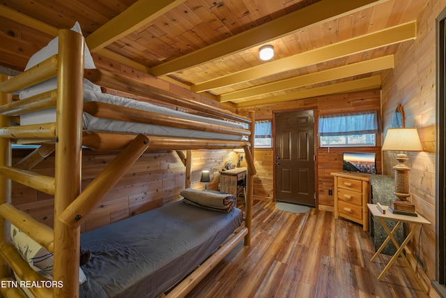 432 W Loop Rd, Gatlinburg, TN 37738 - bedroom with wood walls, wood-type flooring, and a wood ceiling with exposed beams