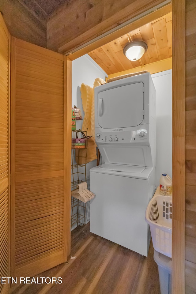 432 W Loop Rd, Gatlinburg, TN 37738 - laundry area with stacked washer / dryer, wood finished floors, and wooden ceiling