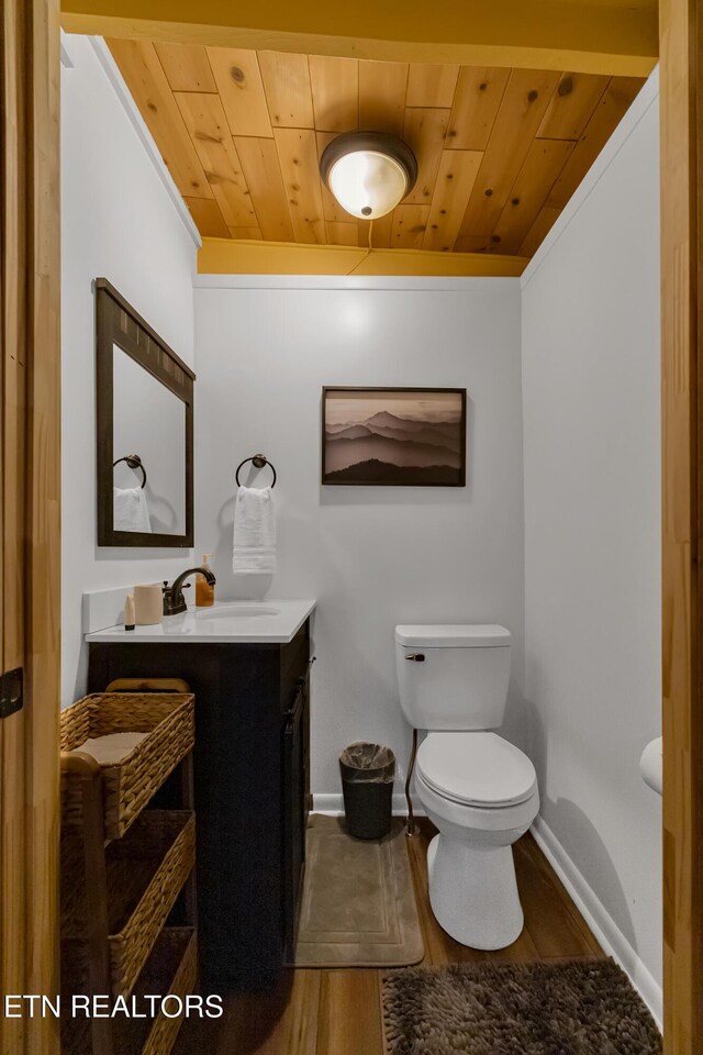 432 W Loop Rd, Gatlinburg, TN 37738 - half bath featuring vanity, wood ceiling, and wood finished floors