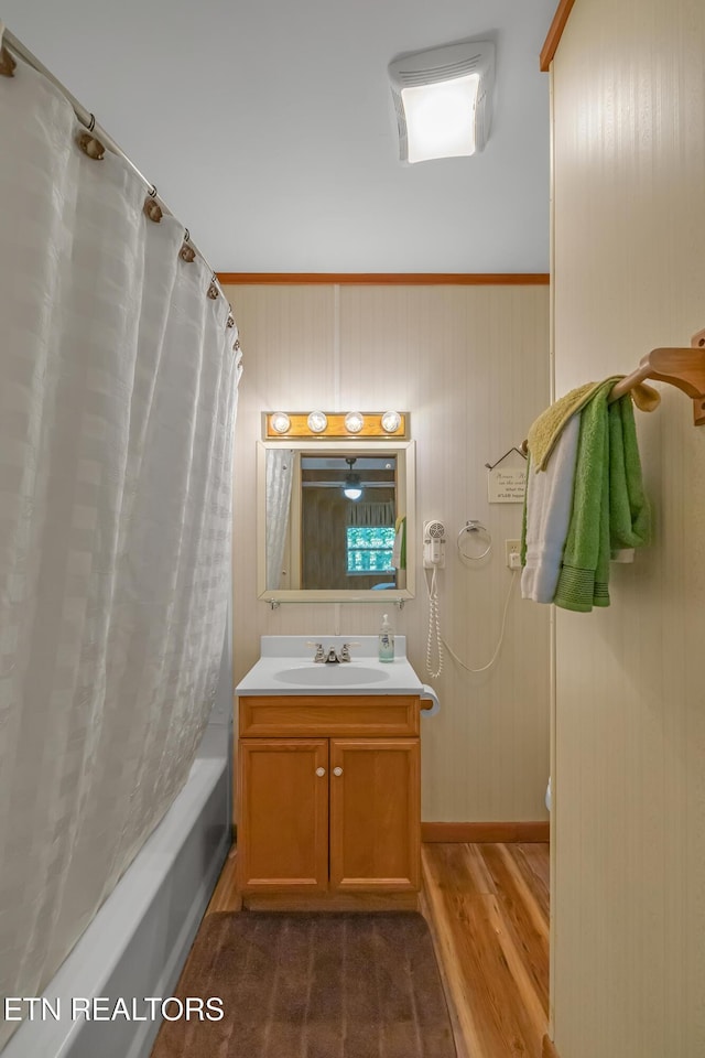 432 W Loop Rd, Gatlinburg, TN 37738 - full bath with wood finished floors, shower / bath combo with shower curtain, and vanity