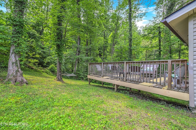 432 W Loop Rd, Gatlinburg, TN 37738 - view of green lawn with a wooden deck