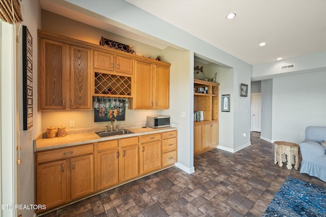 61 Brim Ln, Hilham, TN 38568 - kitchen featuring stainless steel microwave, recessed lighting, light countertops, and dark stone finish floors