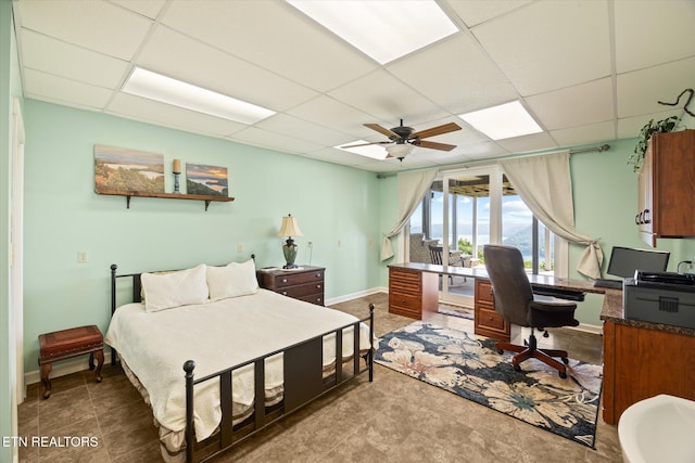 61 Brim Ln, Hilham, TN 38568 - bedroom featuring a drop ceiling, a desk, and a ceiling fan