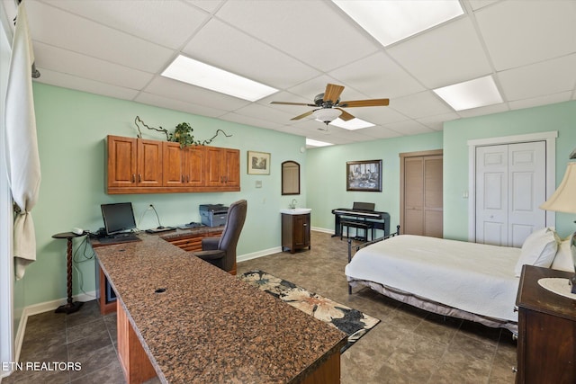 61 Brim Ln, Hilham, TN 38568 - bedroom featuring a drop ceiling, an office area, two closets, and ceiling fan