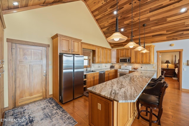 61 Brim Ln, Hilham, TN 38568 - kitchen featuring stainless steel appliances, wooden ceiling, light stone counters, light wood-style floors, and high vaulted ceiling