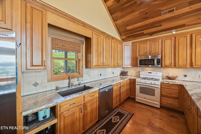 61 Brim Ln, Hilham, TN 38568 - kitchen with stainless steel appliances, vaulted ceiling, wood ceiling, light stone countertops, and wood finished floors