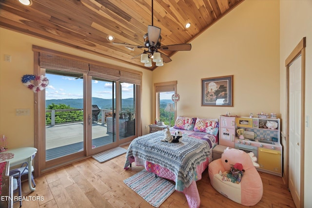 61 Brim Ln, Hilham, TN 38568 - bedroom featuring access to outside, wood ceiling, multiple windows, a mountain view, and wood-type flooring