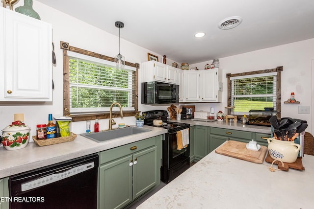 712 S Everett High Rd, Maryville, TN 37804 - kitchen featuring black appliances, green cabinetry, light countertops, white cabinetry, and hanging light fixtures