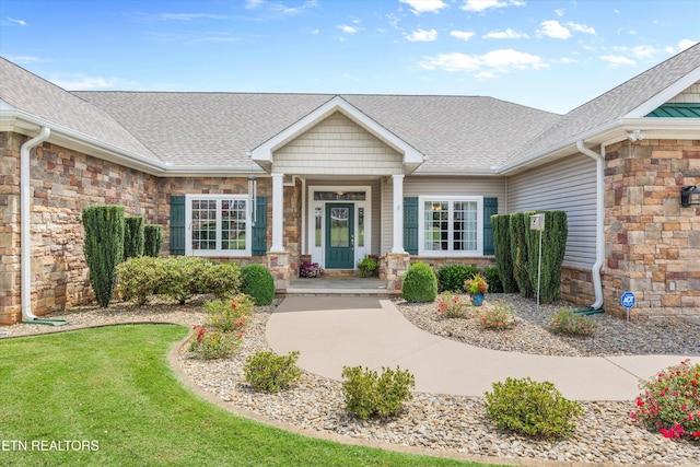 404 Chota Landing Way, Loudon, TN 37774 - doorway to property with stone siding and roof with shingles