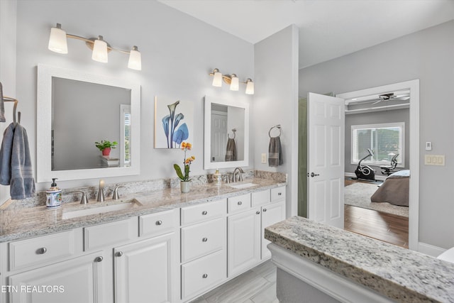 404 Chota Landing Way, Loudon, TN 37774 - ensuite bathroom with double vanity and baseboards
