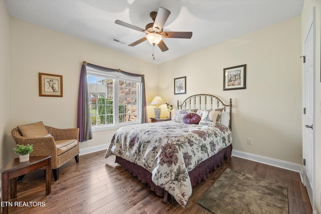 404 Chota Landing Way, Loudon, TN 37774 - bedroom with dark wood-type flooring and a ceiling fan