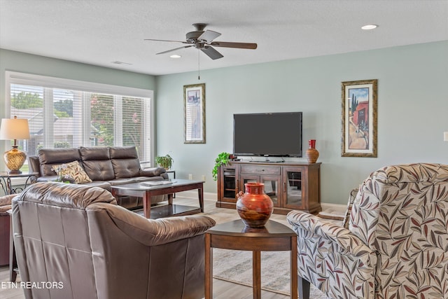 404 Chota Landing Way, Loudon, TN 37774 - living area with wood finished floors, ceiling fan, recessed lighting, and a textured ceiling