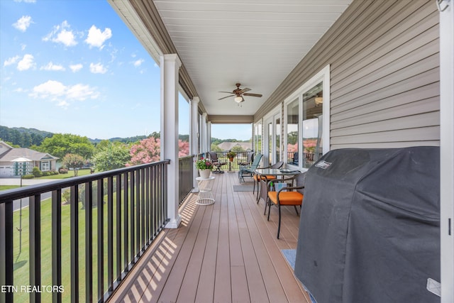 404 Chota Landing Way, Loudon, TN 37774 - wooden terrace with area for grilling and ceiling fan