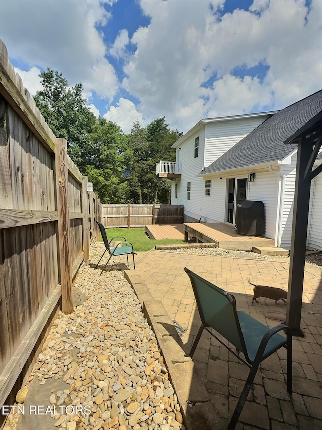 1292 Martin Ln, Lafollette, TN 37766 - fenced backyard with a wooden deck and a patio
