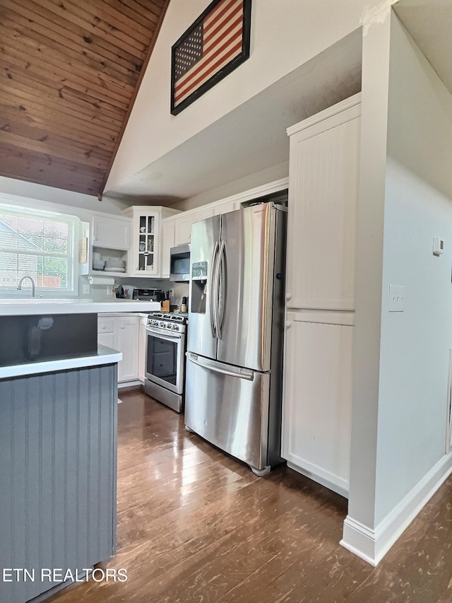 1292 Martin Ln, Lafollette, TN 37766 - kitchen featuring appliances with stainless steel finishes, wood ceiling, lofted ceiling, white cabinets, and glass insert cabinets