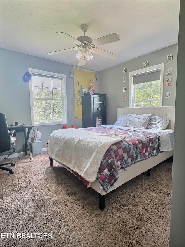 1292 Martin Ln, Lafollette, TN 37766 - bedroom featuring carpet floors, ceiling fan, and a desk