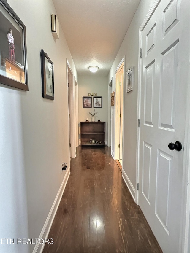 1292 Martin Ln, Lafollette, TN 37766 - hall featuring dark wood-style floors and baseboards