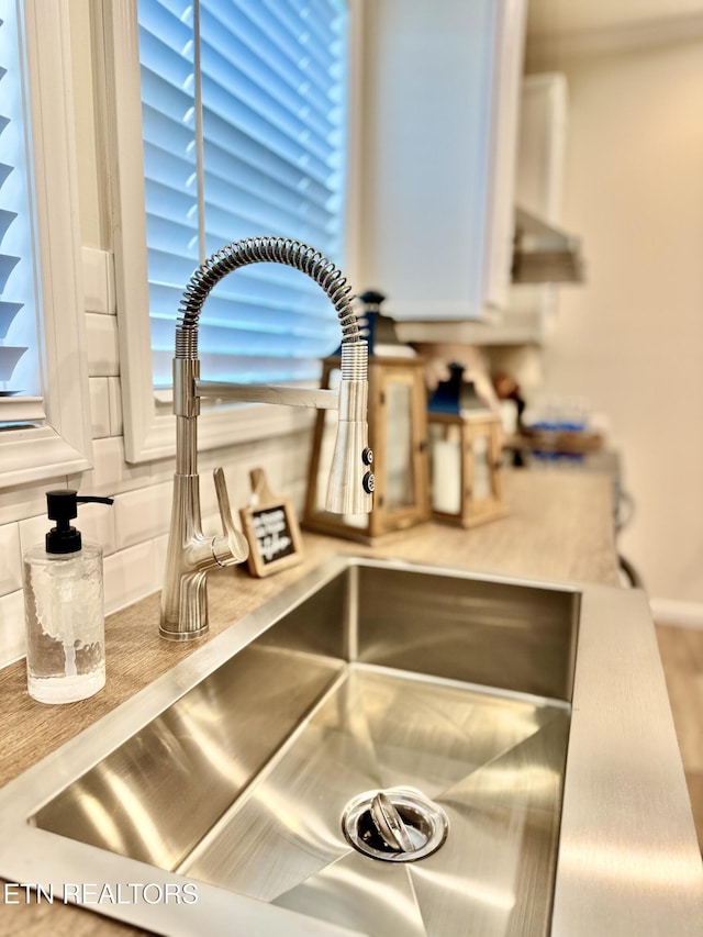 105 Ruby Ln, New Tazewell, TN 37824 - kitchen view of a sink and tasteful backsplash