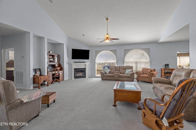 108 Skyline Dr, Dandridge, TN 37725 - living room featuring ceiling fan, lofted ceiling, carpet, plenty of natural light, and a glass covered fireplace